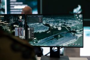 Military personnel working in reconnaissance control tower army base